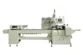 Envasadora horizontal flow pack SF-N sin bandeja para galletas en posición vertical